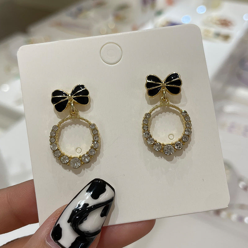 Wholesale Bow Oil Dripping Diamond Snowflake Earrings